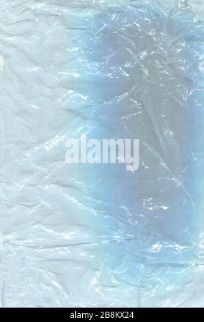 Crumpled cellophane transparent. Cellophane for packaging, blue polyethylene texture Stock Photo