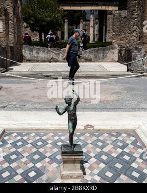 Dancing Faun statue at the House of the Faun, Campania, Pompeii, Italy Stock Photo