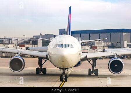 LONDON, ENGLAND - NOVEMBER 2018: head on view of a Delta Airlines Airbus A330 taxiing for take off at London Heathrow Airport. Stock Photo