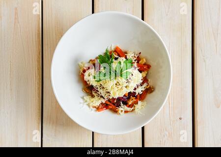 Salad with beetroot, walnut, dried apricot and cheese Stock Photo