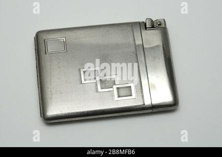 vintage metal cigarette case with lighter Stock Photo - Alamy