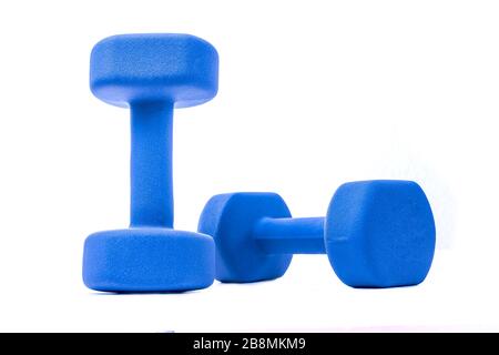 A pair of blue dumbbells isolated on white background Stock Photo