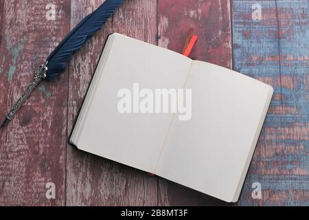 open notebook and fountain pen on table  Stock Photo