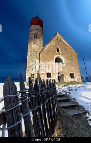 The medieval church of San Nicolò in Monte di Mezzo. Renon plateau, Bolzano province, Trentino Alto-Adige, Italy, Europe. Stock Photo