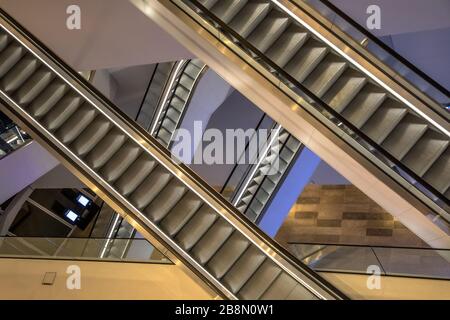 Empty Escalators in modern public library seen from above. Stock Photo