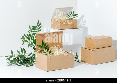Recyclable paper boxes in the corner over white background Stock Photo
