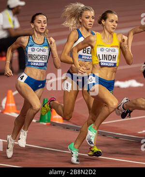 DOHA - QATAR - SEP 27: Alexandra Bell (GB & NI), Natalіya Prishchepa (UKR) and Lovisa Lindh (SWE) competing in the Women's 800m heats during day one o Stock Photo