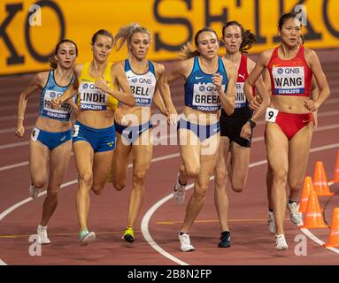 DOHA - QATAR - SEP 27: Lovisa Lindh (SWE), Alexandra Bell (GB & NI), Hanna Green (USA) and Chunyu Wang (CHN) competing in the Women's 800m heats durin Stock Photo