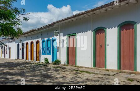 PARATY, RIO DE JANEIRO, BRAZIL - DECEMBER 27, 2019: Urban landscape with colorful houses and cobbled pavements in Paraty, Rio de Janeiro, Brazil.  The Stock Photo