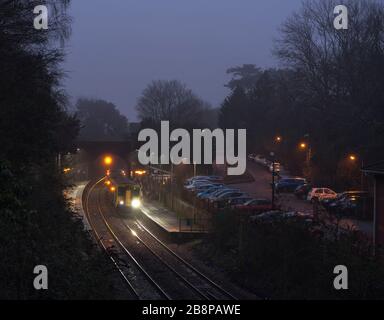 Transport For Wales class 150 sprinter train calling at Llanishen station on the Rhymney valley line, Cardiff at dusk Stock Photo