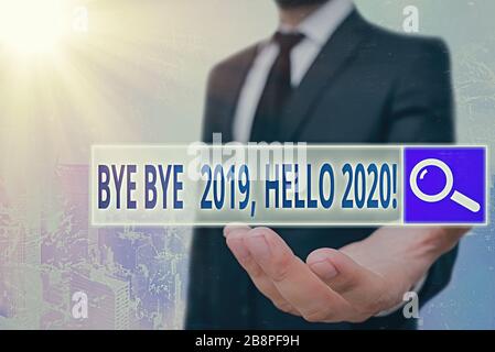 Conceptual hand writing showing Bye Bye 2020 Hello 2020. Concept meaning saying goodbye to last year and welcoming another one Stock Photo