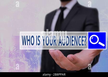 Conceptual hand writing showing Who Is Your Audience Question. Concept meaning who is watching or listening to it Stock Photo