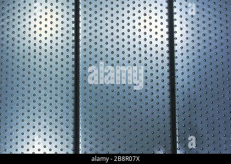 Studded steel plate flooring. Industrial background texture, high resistance material. Stock Photo