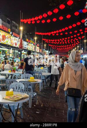 Jalan Alor at night popular for the many alfresco restaurants crowded with tourists and locals Bukit Bintang Kuala Lumpur Malaysia. Stock Photo