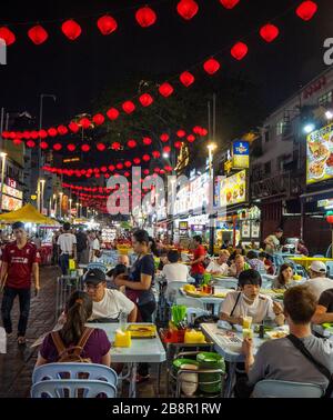 Jalan Alor at night popular for the many alfresco restaurants crowded with tourists and locals Bukit Bintang Kuala Lumpur Malaysia. Stock Photo