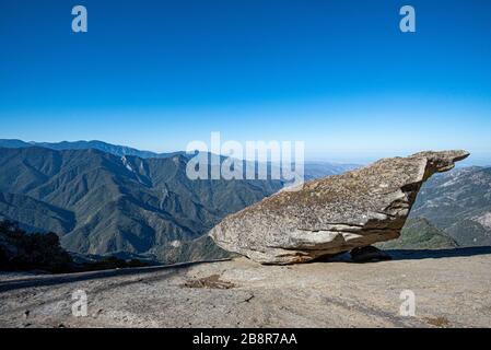 Hangin Rock stands precariously over the Kaweah Valley in Sequoia National Park. Stock Photo
