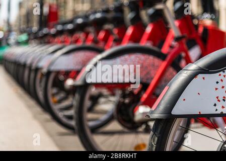 Public bike bicycle transportation sharing system in a big city. Stock Photo