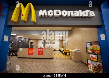 Entrance to McDonald's Franchise inside a Walmart Canada super store. Stock Photo