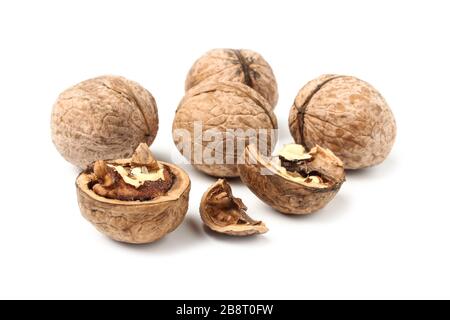 Handful of walnuts isolated on white background Stock Photo