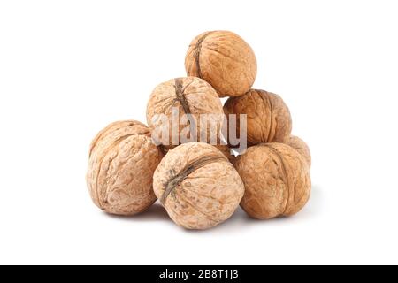Handful of walnuts isolated on white background Stock Photo