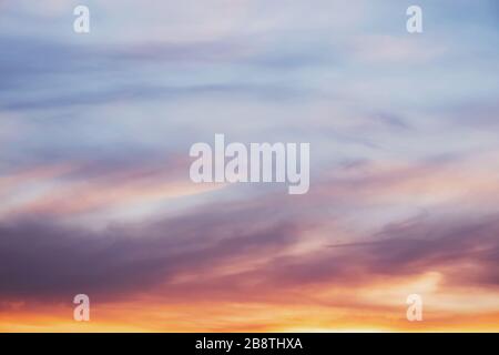 Beautiful dramatic pink sunset sky with clouds. Stock Photo