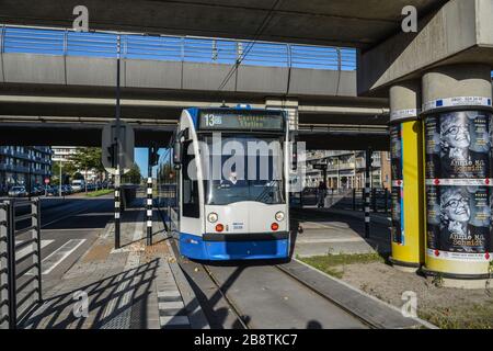Amsterdam, Holland - Oct 7, 2018. Metro train at downtown in Amsterdam, Holland. Amsterdam known for its artistic heritage and narrow houses with gabl Stock Photo
