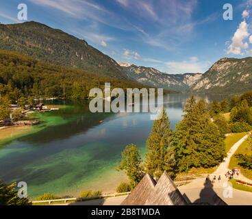 View of scenic Bohinj lake,  the largest permanent lake in Slovenia, located within the Bohinj Valley of the Julian Alps Stock Photo