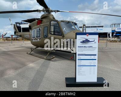 Singapore - Feb 12, 2020. Subaru Bell 412EPX helicopter standing for display in Changi Air Base. Defense costs are increasing, especially in East Asia Stock Photo