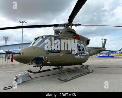 Singapore - Feb 12, 2020. Subaru Bell 412EPX helicopter standing for display in Changi Air Base. Defense costs are increasing, especially in East Asia Stock Photo