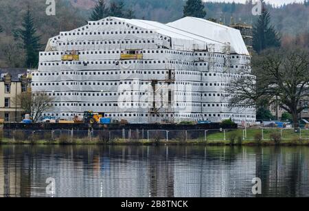 Cameron House, cloaked in scaffolding on the shores of Loch Lomond, Balloch, Loch Lomond, Scotland Stock Photo