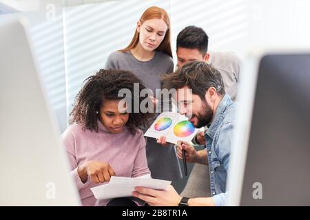 Team of web developers and web designers work together in an internet agency Stock Photo