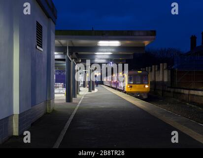 Northern rail class 142 pacer train + class 150 sprinter at Blackburn railway station at dusk