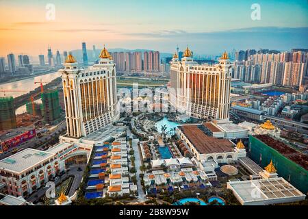 Aerial view of the Galaxy Macau Hotel, a luxurious resort complex, at dusk. Cotai, Macau, China. Stock Photo