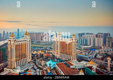 Aerial view of the Galaxy Macau Hotel, a luxurious resort complex, at dusk. Cotai, Macau, China. Stock Photo