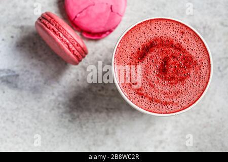 Pink beet latte in ceramic glass. Stock Photo