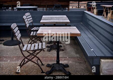 empty outdoor cafe seating area.  cafe closed due to coronavirus Stock Photo