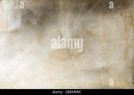 A surface of a worn out metal baking tray, for gastronomy photo background Stock Photo