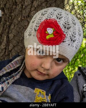 Bartang, Tajikistan - June 17, 2020:  Child in the Bartang Vally at the Pamir Highway in Tajikistan. Stock Photo