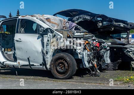 Koln, Germany, 20.04.2019: broken cars in parking lot, cars after crash day closeup Stock Photo