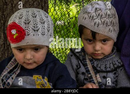 Bartang, Tajikistan - June 17, 2020:  Two children in the Bartang Vally at the Pamir Highway in Tajikistan. Stock Photo