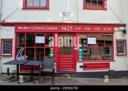 Windsor Berkshire UK. 22nd March 2020. A Chinese Restaurant remains open for takeaways. The building dates back to 1425. Credit Maureen McLean Alamy Stock Photo Alamy