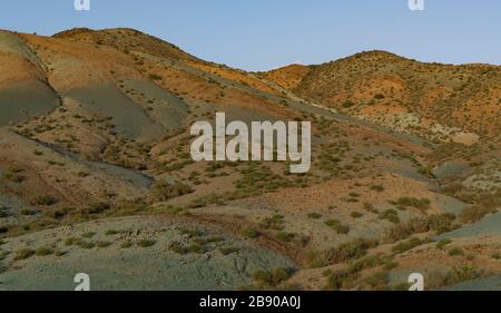 Colored Mountains and hills  near Damghan in the province Semnan during sunset, Iran. Stock Photo