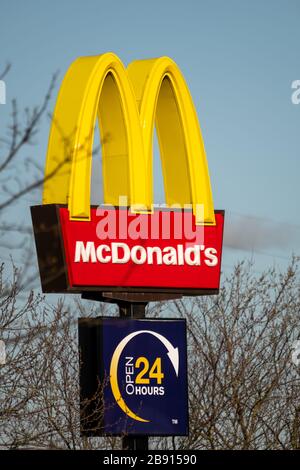 McDonalds street sign for 24 hour McDonald s as McDonald s close