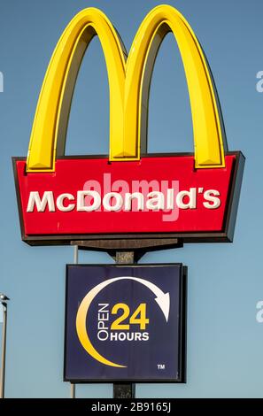 McDonalds street sign for 24 hour McDonald's, as McDonald's close all their restaurants in the UK Stock Photo