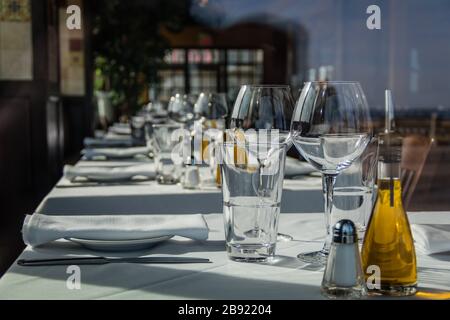 Asbury Park, NJ, USA - March 5, 2020:  Trinity Restaurant interior table setup closed no people Stock Photo