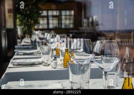 Asbury Park, NJ, USA - March 5, 2020:  Trinity Restaurant interior table setup closed no people Stock Photo