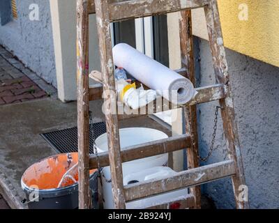 Painter construction site renovation ladder wallpaper Stock Photo
