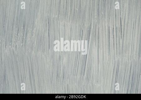 White paint brush strokes on glass surface. Abstract background. Stock Photo