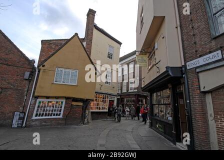 A cluster of 15th century buildings and shops in Low Petergate and The shambles in the old quarter of York, England. Stock Photo