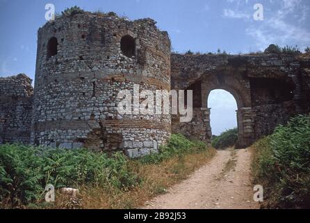 A gateway in the walls of the ancient city of Nicopolis, built by Augustus Caesar (formerly Octavian) to commemorate his victory over the fleets of Mark Antony and Cleopatra in the naval battle of Actium, which took place nearby. Near Preveza, Epirus, Greece. Nicopolis has tentative status as a UNESCO World Heritage Site. Stock Photo